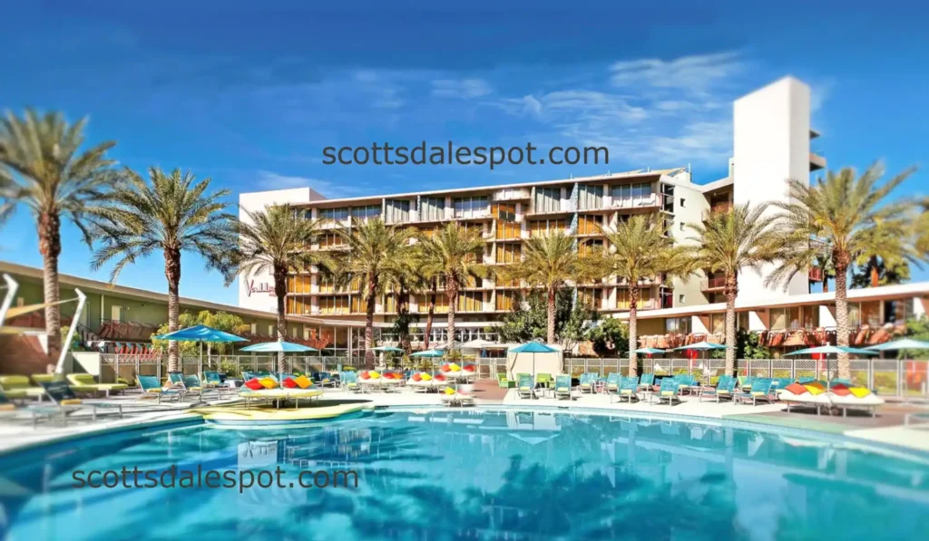 hotel valley ho scottsdale mid century modern pool area retro design palm trees torch lighting