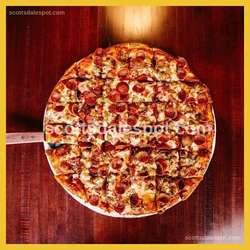 Crust Brothers Pizza award-winning wood-fired pie with perfect char-blistered crust in Scottsdale Arizona
