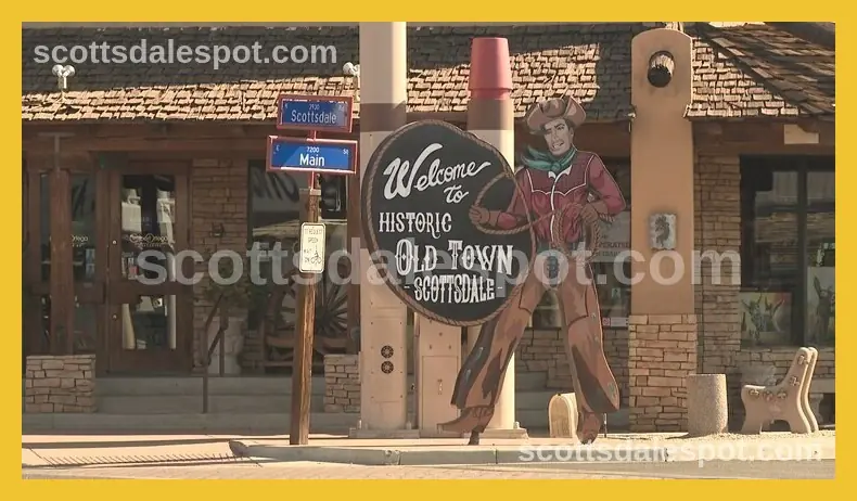 Historic Old Town Scottsdale iconic entrance sign with desert landscape background