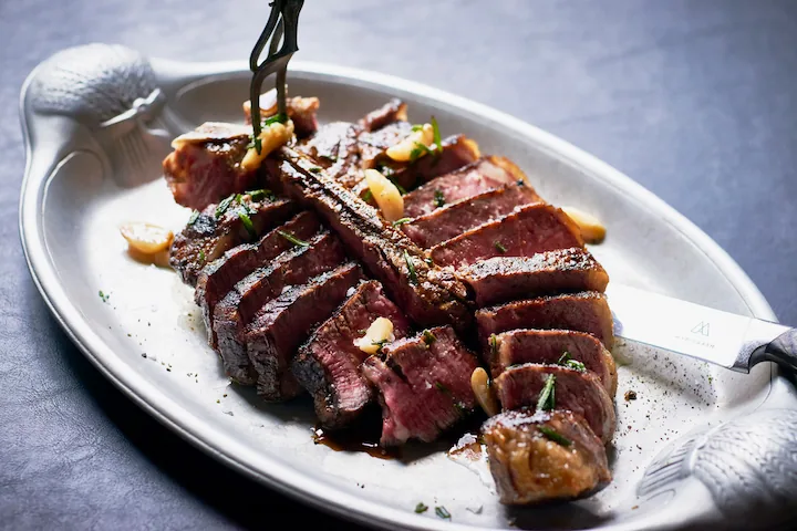 Maple and Ash Scottsdale wood-fired Wagyu steak over open flame