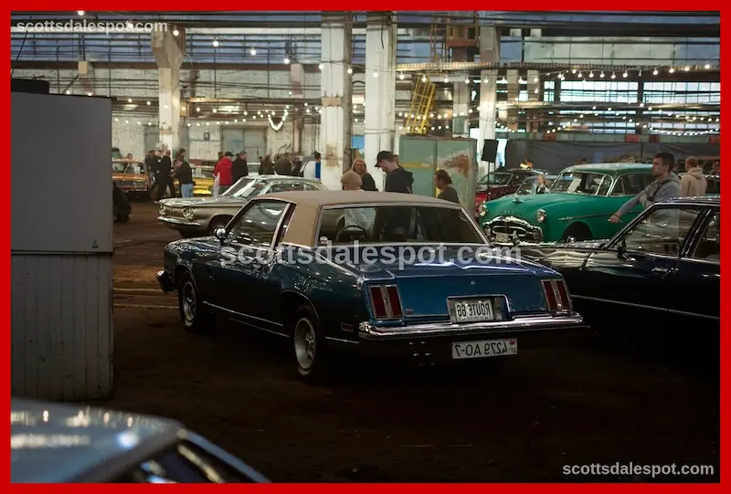 Classic muscle cars lined up at collector car auction in Scottsdale Arizona