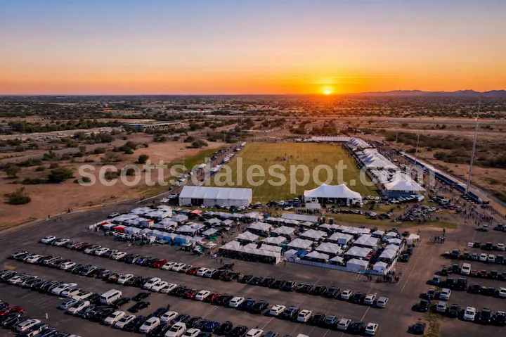 WestWorld Scottsdale sideline parking with cars lined up along polo party field Bentley Championships