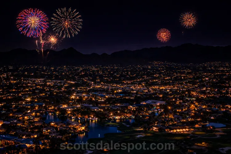 4th of July in Scottsdale Arizona fireworks display over with McDowell Mountains