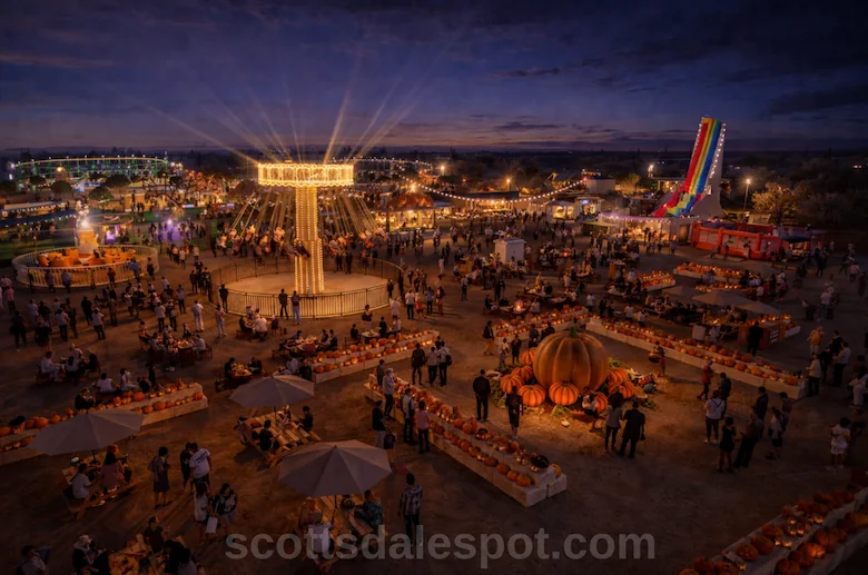 Glowing hot air balloons and costumed crowds event at a Halloween Scottsdale Arizona