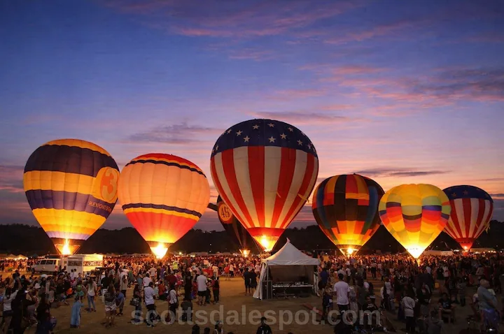 Spooktacular Balloon Festival Scottsdale AZ Halloween with 20 glowing hot air balloons at sunset